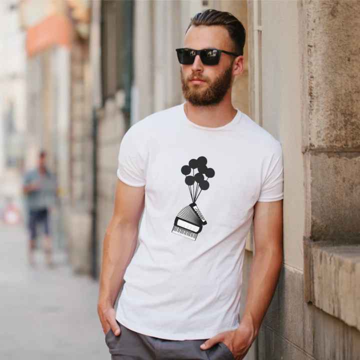 man wearing a banksy inspired folk accordion t-shirt